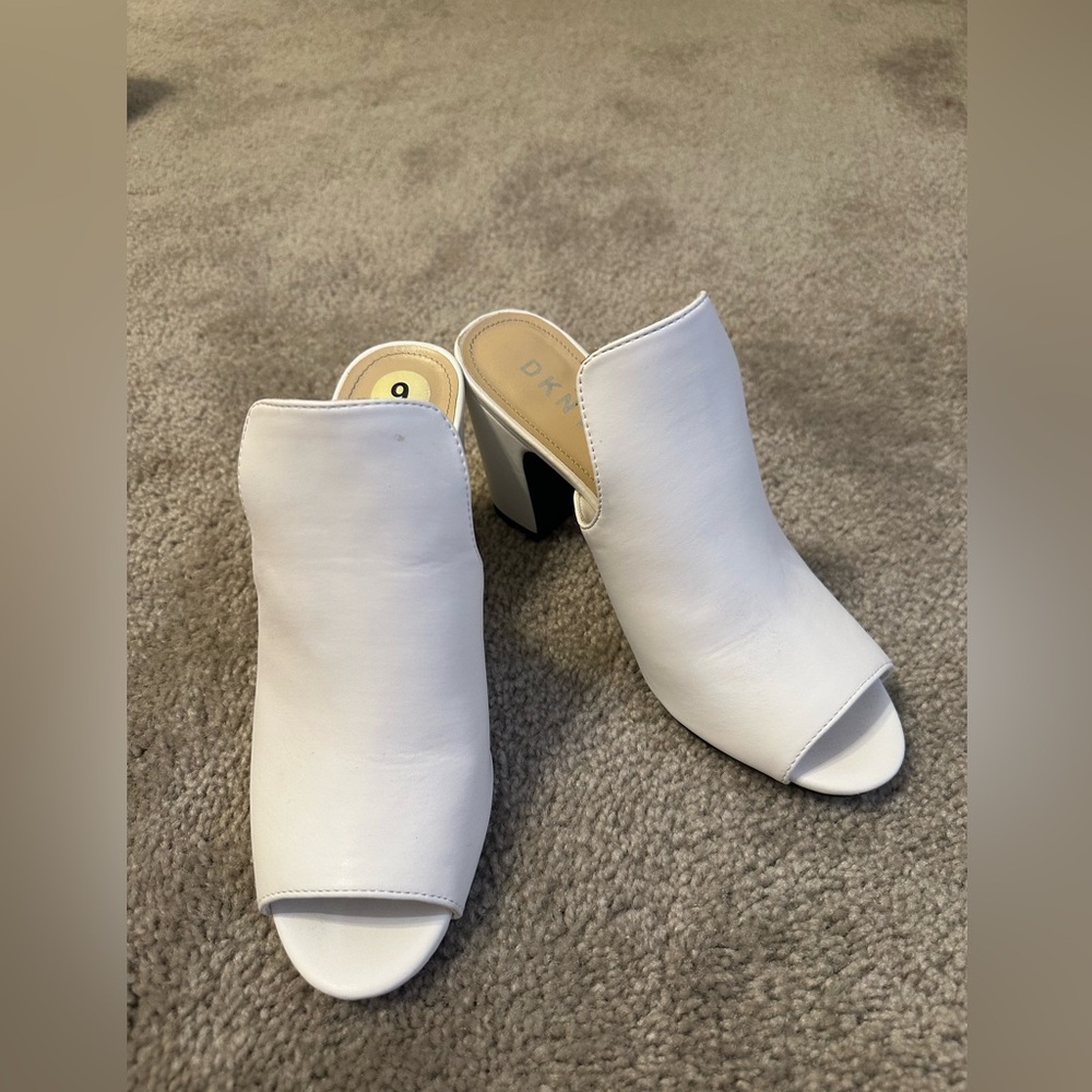 White DKNY chunk heels.